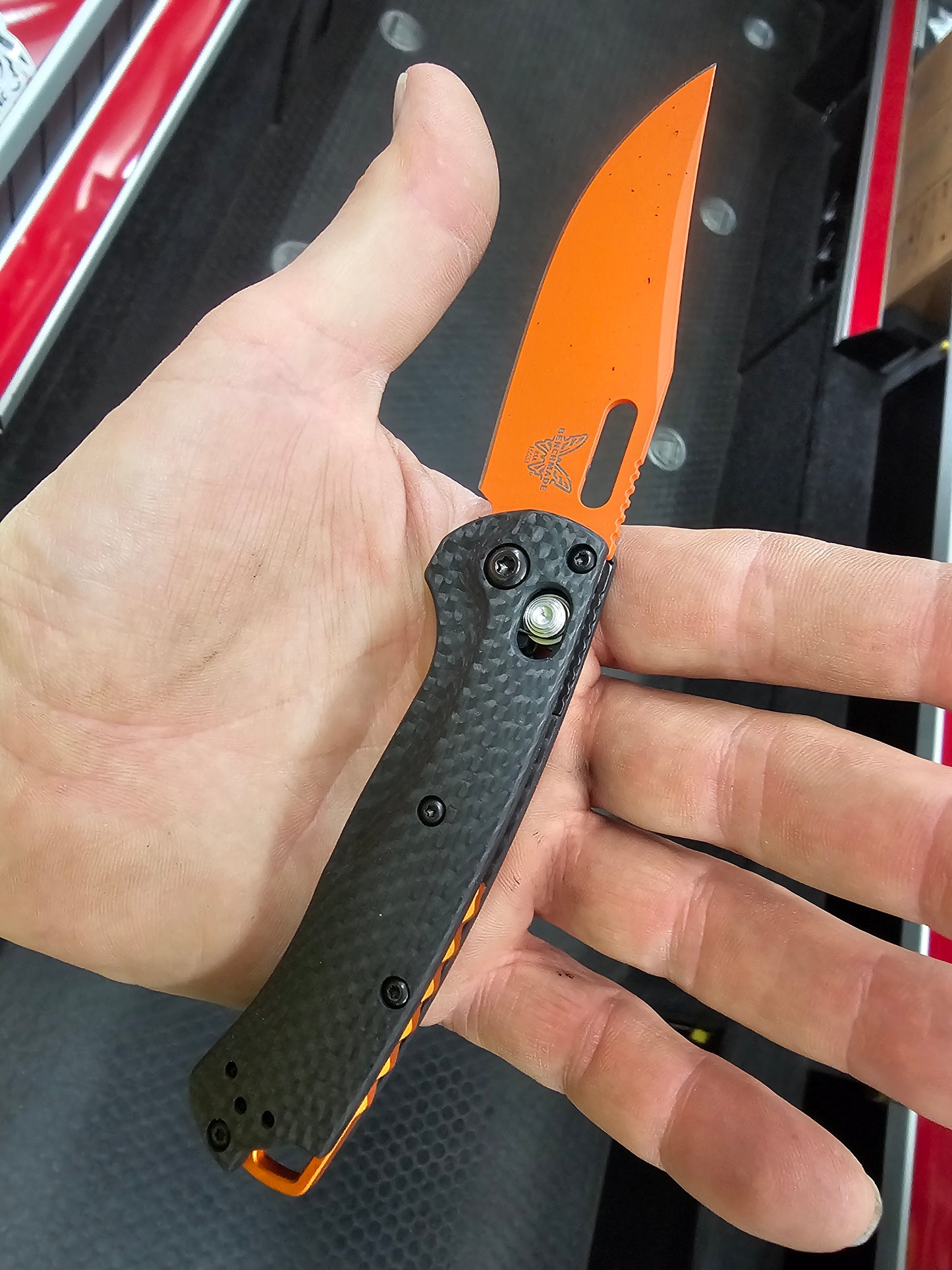 B-USA 15533or-01 M*NI TAGGED OUT CARBON FIBER W/ ORANGEBLADE KNIFE. MADE on a BENCH in Oregon