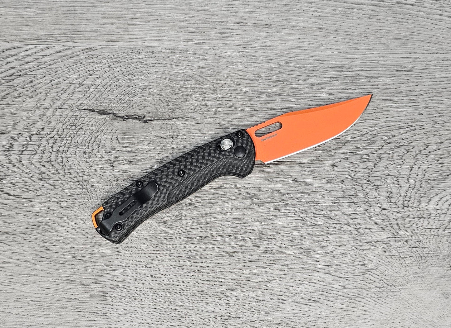B-USA 15533or-01 M*NI TAGGED OUT CARBON FIBER W/ ORANGEBLADE KNIFE. MADE on a BENCH in Oregon