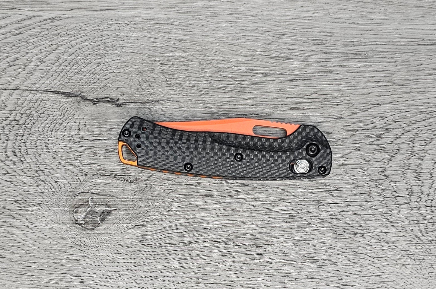 B-USA 15533or-01 M*NI TAGGED OUT CARBON FIBER W/ ORANGEBLADE KNIFE. MADE on a BENCH in Oregon