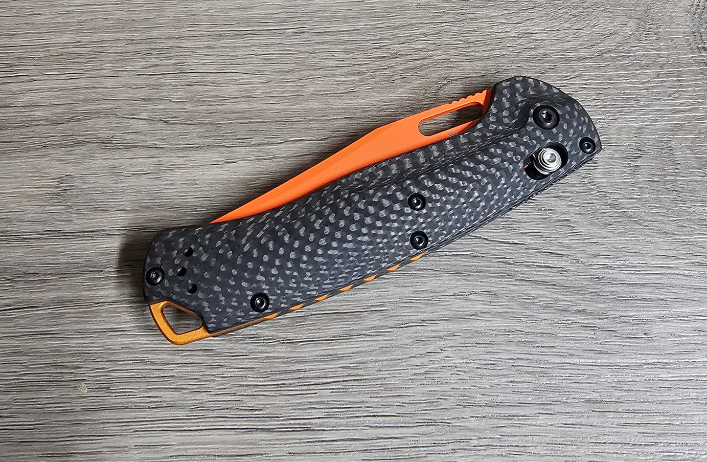 B-USA 15535or-01 TAG*ED OUT CARBON FIBER W/ ORANGEBLADE KNIFE. MADE on a BENCH in Oregon