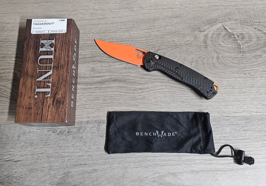 B-USA 15535or-01  TAG*ED OUT CARBON FIBER W/ ORANGEBLADE KNIFE. MADE on a BENCH in Oregon