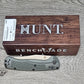 B-USA 15536TN-02  TAG*ED OUT  DEEP OLIVE GREEN W/ TAN BLADE KNIFE. MADE on a BENCH in Oregon