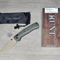 B-USA 15536TN-02  TAG*ED OUT  DEEP OLIVE GREEN W/ TAN BLADE KNIFE. MADE on a BENCH in Oregon