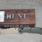 B-USA 15536TN-02  TAG*ED OUT  DEEP OLIVE GREEN W/ TAN BLADE KNIFE. MADE on a BENCH in Oregon