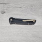 B-USA 710-25  SEV*N TEN BLACK ALUMINUM MADE ON A BENCH IN OREGON USA