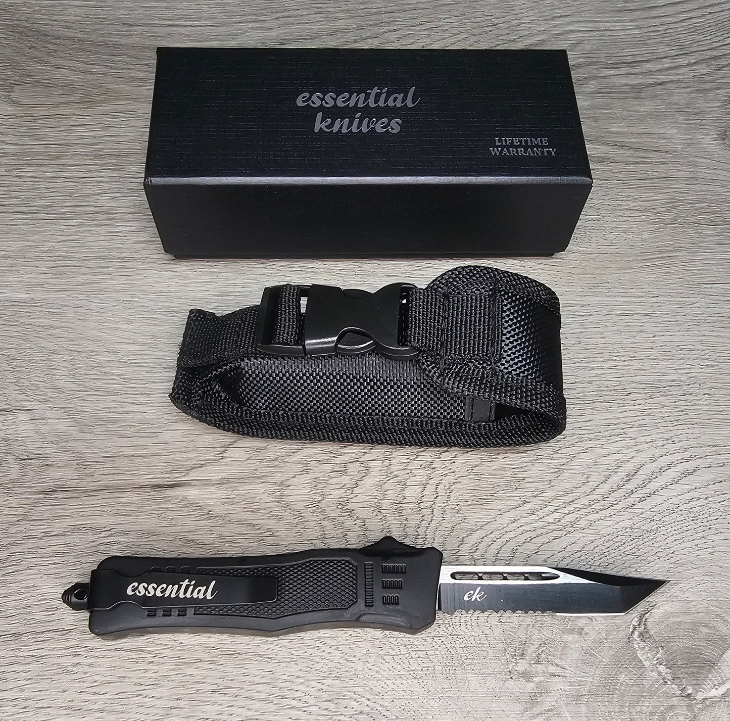 ESSENTIAL KNIVES "THE ESSENTIAL 7" BLACK Out The Front Knife TANTO SERRATED Blade