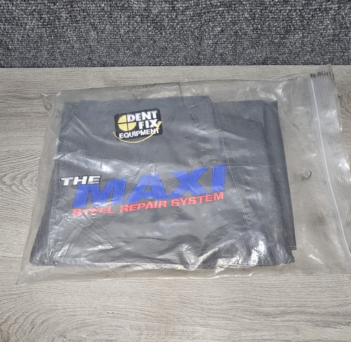 DENT FIX DUST COVER FOR MAXI AND STAND. BRAND NEW ONLY TIME OUT OF PACKAGE WAS FOR PHOTO